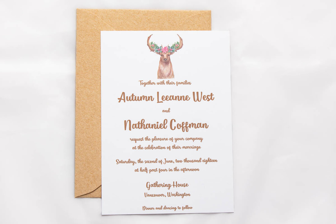 Deer wearing a flower crown wedding invitation with brown text and kraft envelope