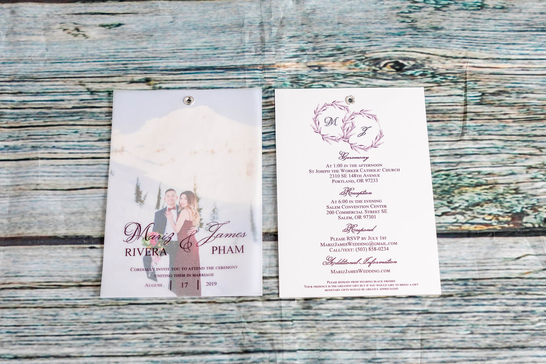 Layered wedding invitation with vellum over photo and information printed on back. Vellum attached to card.