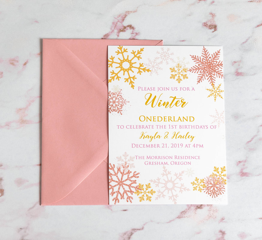 First birthday party invitation with pink and gold snowflakes.  