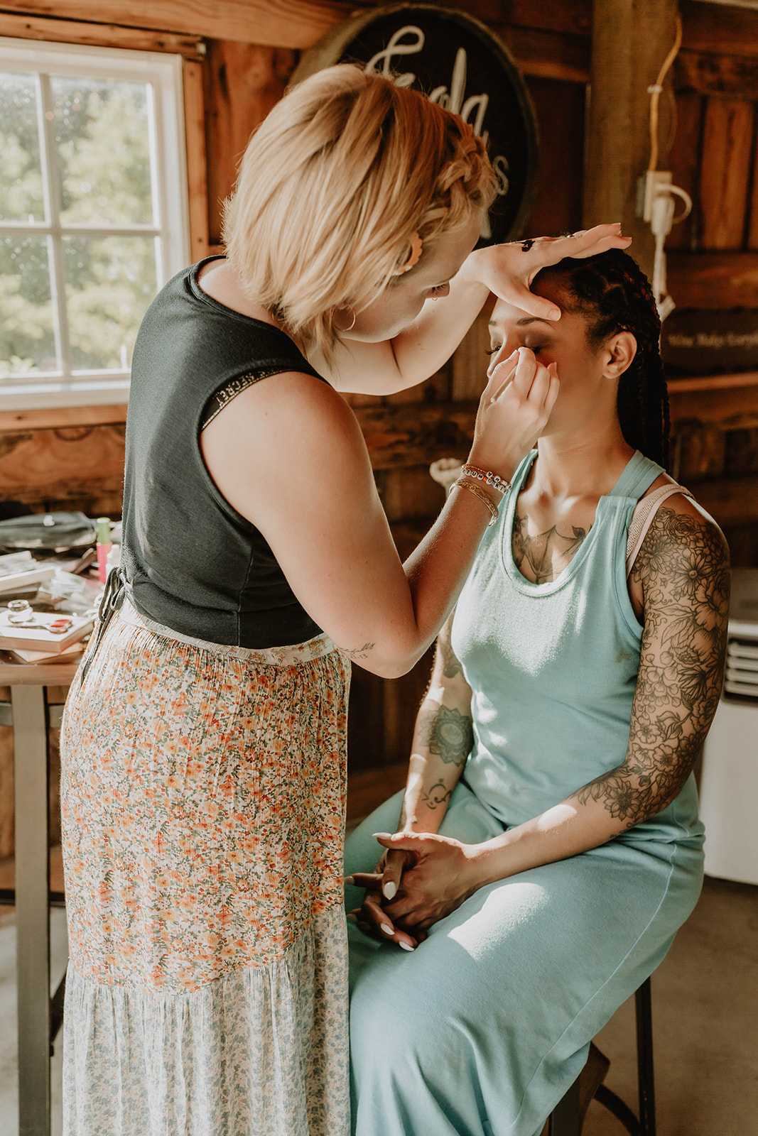 Makeup artist doing makeup on a bride